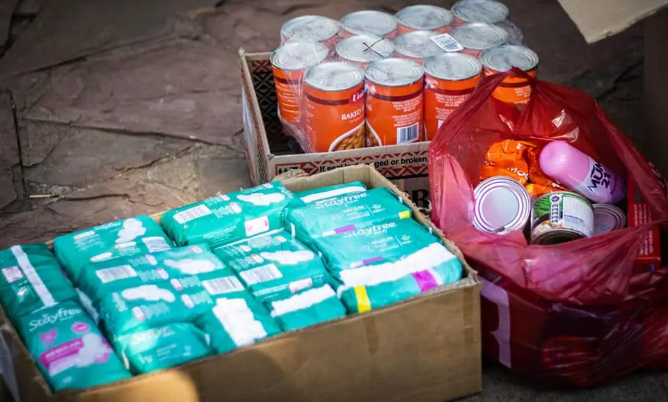 Donated sanitary products and food ready for distribution