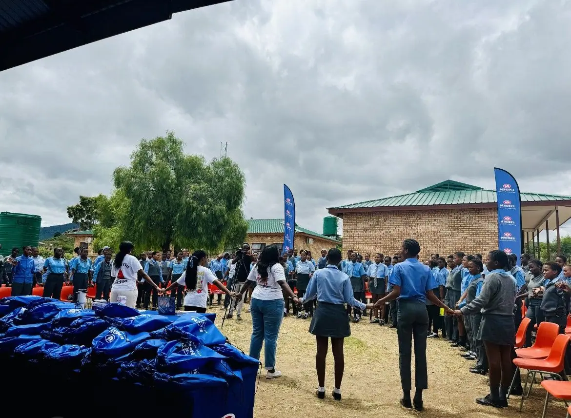 Learners gathered on a school field for an outdoor event