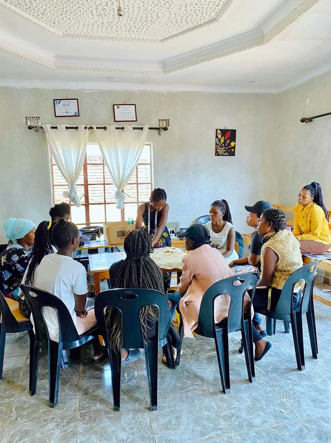 Participants seated in a circle during a classroom workshop