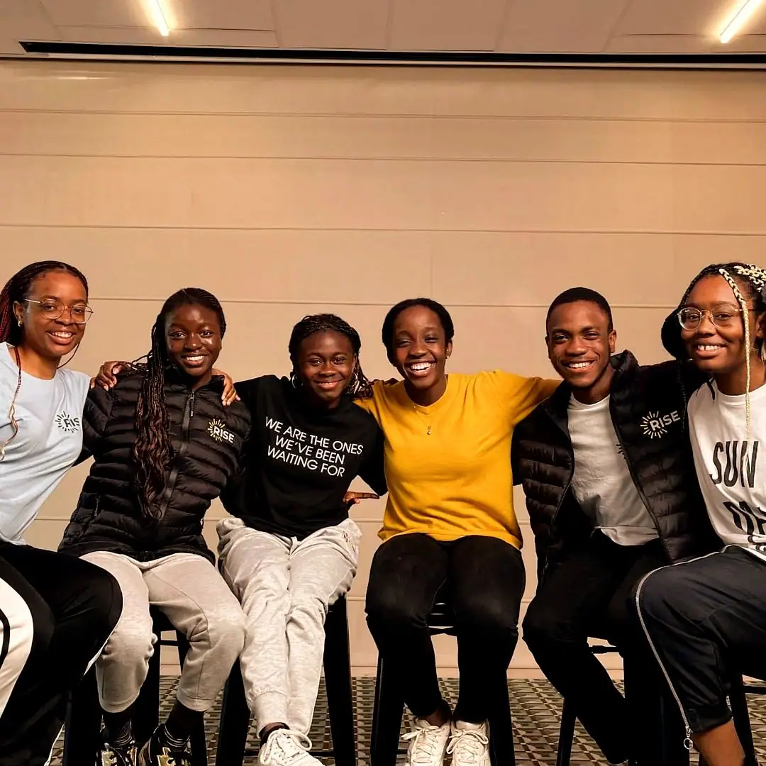 Young people in Africa Matters T-shirts seated in a row